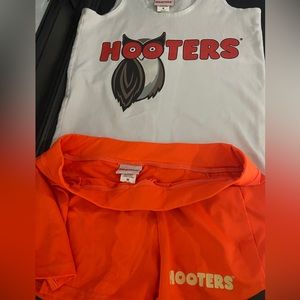 Hooters short and sleeveless shirt set.